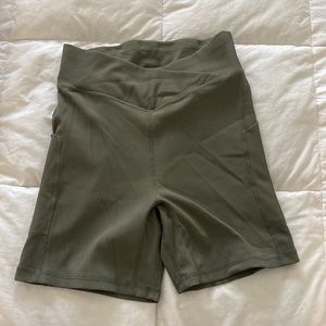 Military green biker shorts with pockets